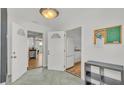 Inviting foyer with views to the updated kitchen and living spaces with tons of natural light at 900 Lake Jessie Dr, Winter Haven, FL 33881