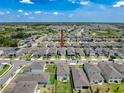 Areal view of neighborhood featuring many similar homes, ponds, and landscaping at 912 Scrub Oak Hammock Rd, Davenport, FL 33837