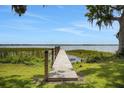 View of private dock, providing direct access to the serene waterfront at 8314 W Lake Marion Rd, Haines City, FL 33844