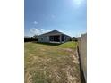 A fenced in spacious backyard at 832 Vienna Dr, Winter Haven, FL 33884