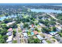 Aerial view showing the property's location in a residential neighborhood with lake access nearby at 961 Piedmont Se Dr, Winter Haven, FL 33880