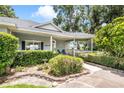 A lovely single story home with lush landscaping, and mature trees at 15 Edwards Shrs, Haines City, FL 33844