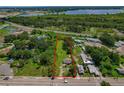 Aerial view displays the generous lot size and proximity to surrounding amenities and major roadways at 407 Snively Ave, Winter Haven, FL 33880