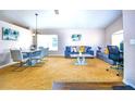 Inviting living room with large windows, plush seating, and contemporary decor at 2169 Rose Blvd, Winter Haven, FL 33881
