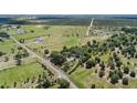 Expansive property with potential building sites, offering privacy and tranquility at 836 S Lake Starr Blvd, Lake Wales, FL 33898