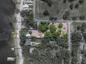 Aerial outline of the property showcasing the land, lake access and lush surroundings at 914 Mangham Rd, Babson Park, FL 33827
