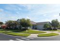 Charming home with a brick driveway, front porch, and well-maintained lawn at 130 Prima Dr, Kissimmee, FL 34759
