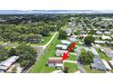 Aerial shot of a cozy home nestled in a quiet residential neighborhood at 1548 Longbow Dr, Lakeland, FL 33810