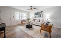 Bright and airy living room with modern decor, neutral color palette, and stylish furnishings at 4921 Sharon Ave, Lakeland, FL 33812
