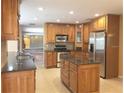 Kitchen with island and stainless steel appliances at 413 Sandy Hill Dr, Longwood, FL 32779