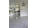 Bright dining area with tile floors and sliding glass doors leading to the backyard at 260 Cranbrook Dr, Kissimmee, FL 34758