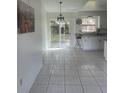 Bright dining area with tile floors and sliding glass doors leading to the backyard at 260 Cranbrook Dr, Kissimmee, FL 34758