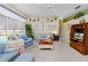 Bright living room featuring comfortable seating, view of pool, and neutral decor at 766 Bryson Loop, Lakeland, FL 33809