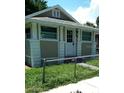 Renovated house with a well-maintained lawn at 645 Cherry St, Daytona Beach, FL 32114