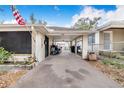 Carport of home featuring ample space and a well-maintained exterior at 3215 Roscoe Ave, Lakeland, FL 33803