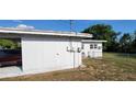 Exterior showcasing the side and rear of the property at 1540 Avenue C Ne, Winter Haven, FL 33881