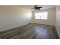 Inviting living room features stylish flooring and a window for lots of natural light at 1920 E Edgewood Dr # D1, Lakeland, FL 33803