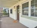 Inviting front porch with neutral colors and cozy welcome mat at 2336 Nansen Ave, Orlando, FL 32817