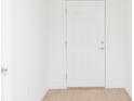 Bright entryway with neutral-toned tile flooring and a white front door at 2173 Lincoln Ln, Bartow, FL 33830