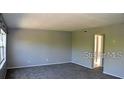 Spacious living room with neutral tones and great natural light at 1000 S Semoran Blvd # 408, Winter Park, FL 32792