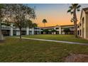 Beautiful exterior view of this Kissimmee property with well-maintained landscaping and palm trees at 5245 W Irlo Bronson Memorial Hwy # 113, Kissimmee, FL 34746