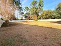Large, fenced backyard with plenty of space for outdoor activities and entertaining at 5704 Sw 108Th St, Ocala, FL 34476