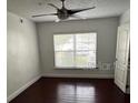 Neutral bedroom with hardwood floors and window at 2013 Dixie Belle Dr # 2013K, Orlando, FL 32812