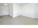 Bright living room showcasing stylish tile floors and a welcoming atmosphere at 2117 Emma Ln, Lake Wales, FL 33898