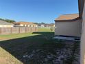 Spacious fenced-in backyard at 6608 Madeira Ave, Lakeland, FL 33811