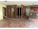 Renovation opportunity: Spacious room with exposed studs, ready for customization and finishing at 907 N Hyer Ave, Orlando, FL 32803