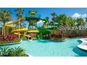 Exterior shot of the waterpark featuring multiple slides and a tower at 14501 Grove Resort Ave # 1637, Winter Garden, FL 34787