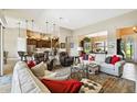 Spacious living room featuring comfortable seating and a cozy atmosphere at 154 Rancho Mirage Dr, Kissimmee, FL 34759