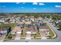 Spacious community with well-maintained lawns and landscaping featuring single-Gathering homes at 185 Brookes Pl, Haines City, FL 33844