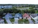 Aerial view of home, showcasing its location in a vibrant neighborhood at 5906 Rywood Dr, Orlando, FL 32810