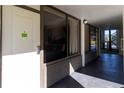 Exterior view of a hotel unit featuring a door and a window showing the interior bedroom at 5245 W Irlo Bronson Memorial Hwy # 160, Kissimmee, FL 34746