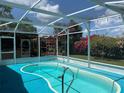 Enjoy this sparkling screened-in pool perfect for relaxation and entertaining friends and Gathering at 112 10Th St, St Cloud, FL 34769