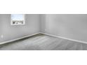 Neutral bedroom with carpet, natural light from the window, and electrical outlets at 1651 Sugarbelle Cir, Mascotte, FL 34753