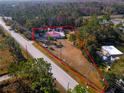 Aerial view of property showing house and large lot at 1808 S Tanner Rd, Orlando, FL 32820
