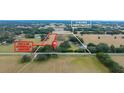 Aerial view of 17 acres with airstrip and pond at 8836 Sr 471 Hwy, Webster, FL 33597