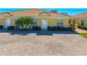 Charming home with lush landscaping, brick paved driveway, and a covered front entry at 1819 Coriander Dr # 1819, Kissimmee, FL 34759