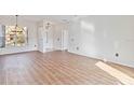 Spacious dining area with wood-look floors and natural light at 3634 Northwoods Dr, Kissimmee, FL 34746