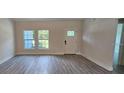 Bright living room with hardwood floors and neutral walls at 6817 Sw 131St Pl, Ocala, FL 34473