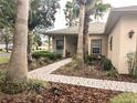 Brick pathway leads to the entrance of the house at 753 Largo Pass, Poinciana, FL 34759