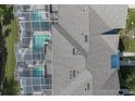 Top-down view of townhomes, showing private screened pools at 890 Pebble Beach Dr, Davenport, FL 33896
