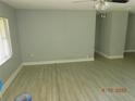 Spacious living room featuring modern tile flooring and abundant natural light at 436 Michigan Ave, St Cloud, FL 34769