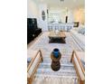 Spacious living room featuring a modern aesthetic and comfortable furniture at 11926 Sunsail Ave, Orlando, FL 32832