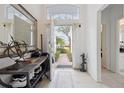 Bright and spacious entryway with a view of the backyard at 2835 Crane Trace Cir, Orlando, FL 32837
