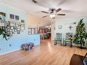 Living room with hardwood floors, Christmas tree, and rocking chairs at 301 Evandee Ct, Kissimmee, FL 34758