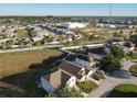 Aerial view of the house and surrounding area at 124 Cassia Dr, Davenport, FL 33897