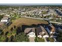 Aerial view of house and neighborhood at 124 Cassia Dr, Davenport, FL 33897
